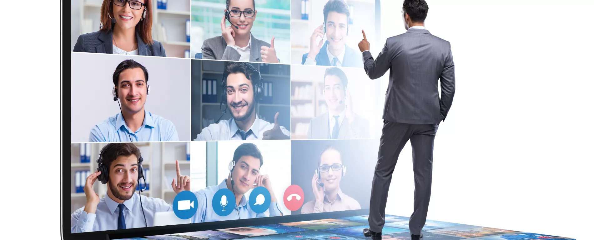 Man speaking to many people on a zoom meeting